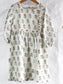 Anar Butti in White dress