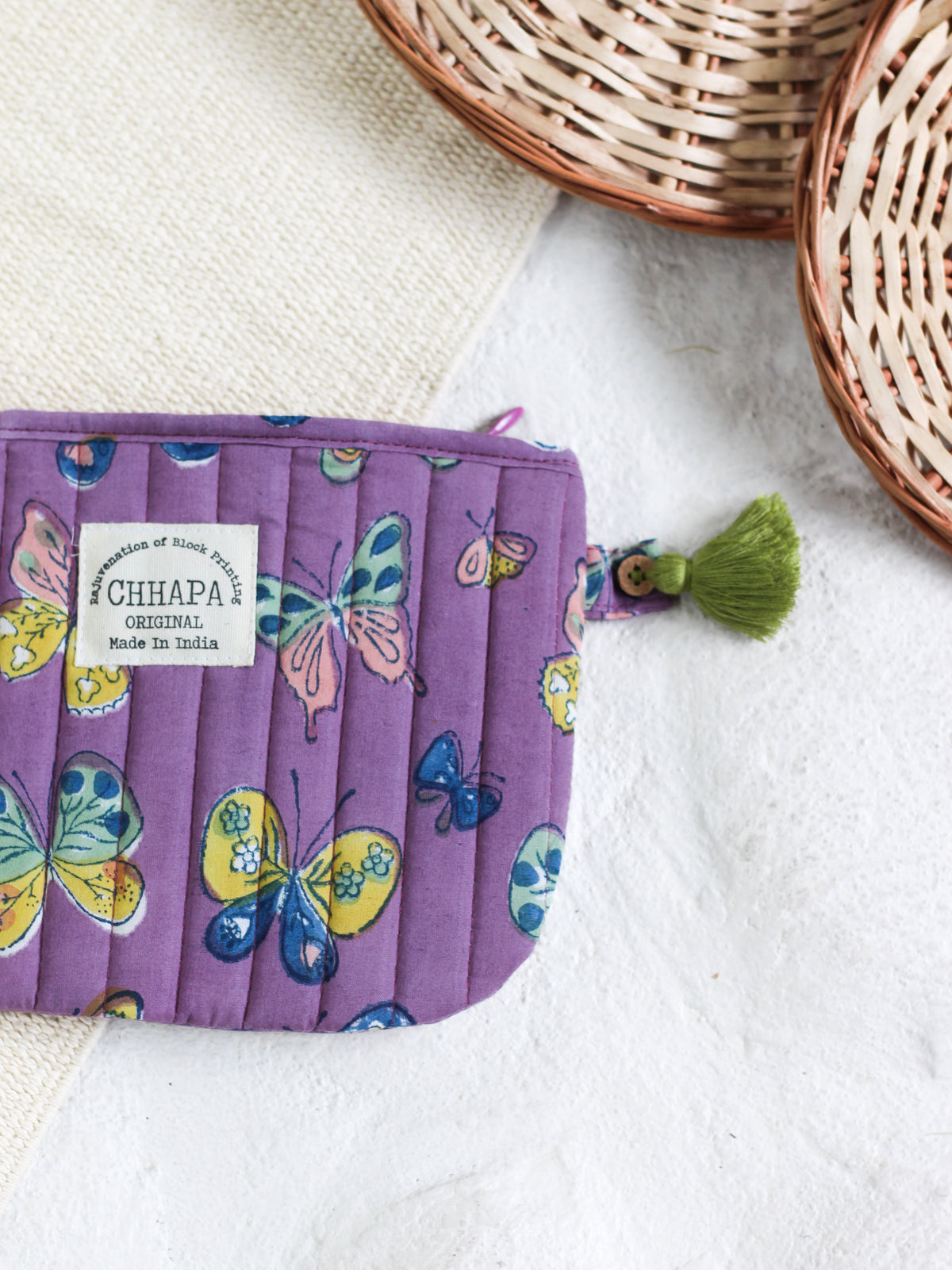 BUTTERFLY IN PURPLE POUCH
