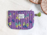 BUTTERFLY IN PURPLE POUCH