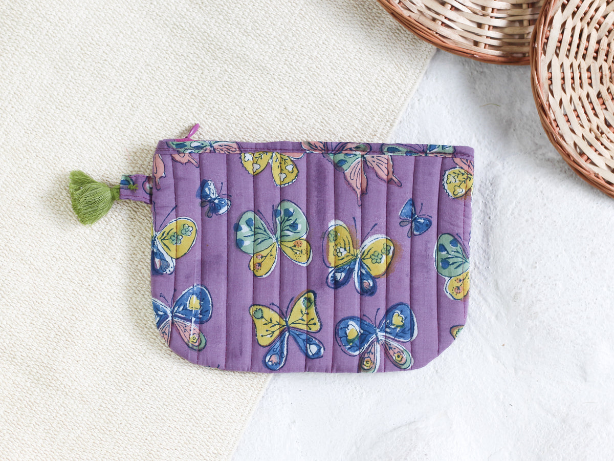 BUTTERFLY IN PURPLE POUCH