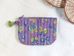 BUTTERFLY IN PURPLE POUCH